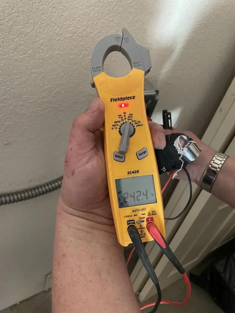 Voltage testing with clamp meter during Whole House Surge Protector in Roseburg North